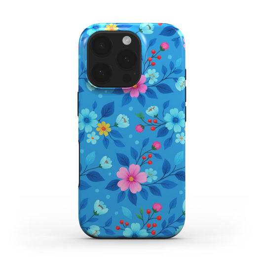 Florale MagSafe Handyhülle für iPhone mit farbigem Blumenmuster auf Blau – Rückansicht
