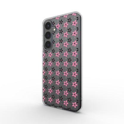 Transparente Smartphone-Hülle mit pink-schwarzem Blumenmuster in schräger Rückansicht.