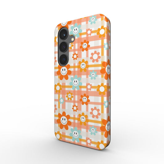 Stoßfeste Tough Handyhülle mit Smiley-Blumen im Karo-Design, schräg dargestellt, glänzende Außenschale.